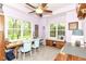 Bright craft room with windows, ceiling fan, and custom storage for organization at 6340 W 800 S, Pendleton, IN 46064