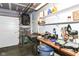 Garage featuring a workbench, shelves with tools, and ample storage space at 6340 W 800 S, Pendleton, IN 46064
