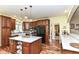 Spacious kitchen with stainless steel appliances, a center island, and hardwood flooring at 6340 W 800 S, Pendleton, IN 46064
