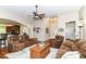 Spacious living room featuring hardwood floors, a ceiling fan, and comfortable seating at 6340 W 800 S, Pendleton, IN 46064