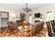 Comfortable living room with a fireplace, hardwood floors, and natural lighting at 6340 W 800 S, Pendleton, IN 46064