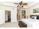 Main bedroom boasts a tray ceiling, with an en-suite bathroom and built-in bookcase at 6340 W 800 S, Pendleton, IN 46064