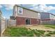 Backyard with wood fence, and brick wall at 6540 Mccreery Ct, Indianapolis, IN 46221