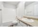 Bathroom featuring a single vanity, toilet, and shower/tub combo at 6540 Mccreery Ct, Indianapolis, IN 46221