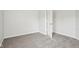 Neutral bedroom featuring soft carpeting and a closet at 6540 Mccreery Ct, Indianapolis, IN 46221