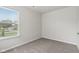Comfortable bedroom features a window and neutral carpet flooring at 6540 Mccreery Ct, Indianapolis, IN 46221