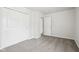 This bedroom is carpeted in gray and has a double door closet at 6540 Mccreery Ct, Indianapolis, IN 46221