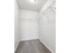 Walk-in closet with wire shelving and gray carpet at 6540 Mccreery Ct, Indianapolis, IN 46221