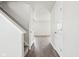 Hallway leads to carpeted stairs and an open living area at 6540 Mccreery Ct, Indianapolis, IN 46221