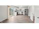 Bright kitchen with white cabinetry, stainless steel appliances, and access to the backyard at 6540 Mccreery Ct, Indianapolis, IN 46221