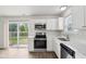 Bright kitchen offers stainless steel appliances and plenty of natural light at 6540 Mccreery Ct, Indianapolis, IN 46221