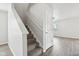 Carpeted stairway ascends to the upper level of the home at 6540 Mccreery Ct, Indianapolis, IN 46221