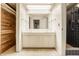 Bathroom with double sink vanity and tiled shower with glass door at 728 E Main St, Carmel, IN 46032