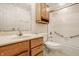Well-maintained bathroom featuring a single vanity and tub with shower at 728 E Main St, Carmel, IN 46032
