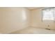 Bright bedroom with neutral carpet, pale walls, and a window with sheer curtains at 728 E Main St, Carmel, IN 46032
