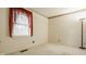 Cozy bedroom with a large window and simple decor at 728 E Main St, Carmel, IN 46032