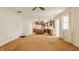 Open floor plan showing the kitchen with island and living area at 728 E Main St, Carmel, IN 46032