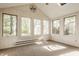 Bright sunroom featuring multiple windows and ample natural light at 728 E Main St, Carmel, IN 46032