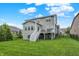 Back of house with lawn, deck, siding and fenced in yard at 769 Canberra Blvd, Westfield, IN 46074