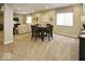 Spacious finished basement featuring a dining area, living room, and neutral carpet at 769 Canberra Blvd, Westfield, IN 46074
