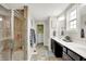 Beautiful bathroom with a glass shower, double sink vanity, and neutral color palette at 769 Canberra Blvd, Westfield, IN 46074
