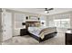 Serene main bedroom with large windows offering a view of the water and a ceiling fan at 769 Canberra Blvd, Westfield, IN 46074