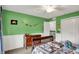 ' bedroom with fun green walls, twin bed, and charming decor at 769 Canberra Blvd, Westfield, IN 46074