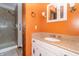 Bathroom featuring single sink vanity with granite countertop and a shower at 8292 E 100 S, Greenfield, IN 46140
