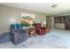 Cozy living room with mountain tapestry, comfortable seating and wood accents, offering a relaxing space at 8292 E 100 S, Greenfield, IN 46140
