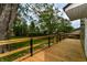 Inviting wooden deck overlooking the expansive backyard, perfect for outdoor entertaining and relaxation at 8308 W Main St, Coatesville, IN 46121