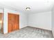 Bedroom featuring neutral carpet, wood trim, and natural light, perfect for relaxation and comfort at 8308 W Main St, Coatesville, IN 46121