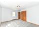 Bedroom featuring a plush carpet, natural light, and neutral paint, creating a peaceful and comfortable space at 8308 W Main St, Coatesville, IN 46121