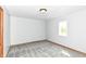 Bedroom showcasing a plush gray carpet, natural light, and neutral paint, creating a peaceful and inviting space at 8308 W Main St, Coatesville, IN 46121