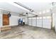 Bright two-car garage features a new insulated door, water heater, access door, and convenient lighting at 8308 W Main St, Coatesville, IN 46121