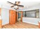 The open concept kitchen features wood cabinets and view into adjoining living area at 8308 W Main St, Coatesville, IN 46121