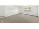 Spacious bedroom with soft carpet and bright, natural light at 8910 Youngs Creek Ln, Indianapolis, IN 46113