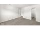 Spacious bedroom featuring neutral carpet, fresh paint, and ample closet space at 8910 Youngs Creek Ln, Indianapolis, IN 46113