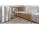 Well-equipped kitchen with stainless steel appliances and stylish backsplash at 8910 Youngs Creek Ln, Indianapolis, IN 46113