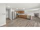 Open kitchen showcasing stainless steel appliances and wood cabinetry at 8910 Youngs Creek Ln, Indianapolis, IN 46113