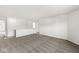 Upstairs loft with neutral paint and plush carpet at 8910 Youngs Creek Ln, Indianapolis, IN 46113