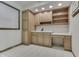 Office space complete with desk area, lots of shelving and drawers and neutral color palette at 912 Ramblin Rd, Greenwood, IN 46142