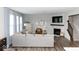 Elegant living room featuring a fireplace, comfortable seating, and a staircase at 9176 Springbrook Dr, Pendleton, IN 46064