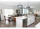 Open concept living and dining area boasts natural light and easy access to backyard at 9176 Springbrook Dr, Pendleton, IN 46064