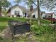 A spacious backyard featuring a raised garden bed and ample greenery at 9653 Woodsong Way, Indianapolis, IN 46229