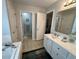 Bathroom featuring double sink vanity and bathtub at 9653 Woodsong Way, Indianapolis, IN 46229