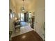 Inviting foyer with tile flooring, access to the living room and decor at 9653 Woodsong Way, Indianapolis, IN 46229