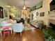 Spacious living room with hardwood floors, fireplace, comfortable seating, and stylish decor at 9653 Woodsong Way, Indianapolis, IN 46229