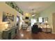 Bright and airy living room with high ceilings, fireplace, and hardwood floors at 9653 Woodsong Way, Indianapolis, IN 46229