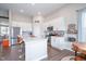 Modern kitchen featuring white cabinets, stainless steel appliances, a spacious island, and ample counter space at 9804 Canyon Ln, Pendleton, IN 46064