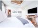 Bright main bedroom with recessed lighting, wood ceiling, and hardwood accents at 9804 Canyon Ln, Pendleton, IN 46064